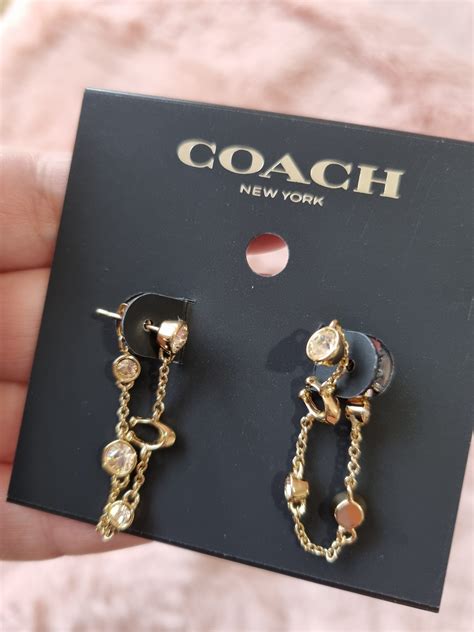 Comprar Aretes Coach de segunda mano .